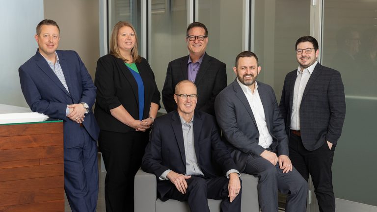 Rinderknecht Associates Standing left to right: Kelly Edmonds, Miranda Von Ahsen, Scott Friauf, Louis Ruggio. Seated/front row: Gordon Parker, Bob Gaffney. Photo credit: StudioU