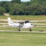 An airplane taxis down the runway at the Iowa City Municipal Airport. The airport received $442,800 to fund a solar project that will reduce electric utility costs in half.