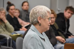 A member of the Historic Friends Society speaks in support of the historic landmark proposal for 302 and 316 E. Bloomington St. 