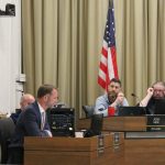 Iowa City attorney Eric Goers (left), speaks to the council at its March 19 meeting.