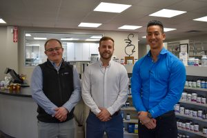 From left to right: Austin Oyen, PharmD, Aaron McDonough, PharmD, and Matt Yeates, PharmD, have partnered to operate Towncrest Wellness Apothecary, a reduced-cost pharmacy in Iowa City. CREDIT ALEXANDRA OLSEN