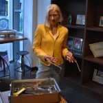 Maria Iliakova poses with some surgical tools that were housed in a metal container. Dr. Iliakova says she has found a more efficient way to keep track of the container and its tools.