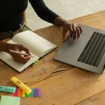 hands on a computer keyboard, black-owned business, working