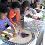 Young participants work with LEGO-based projects during a CoderDojo held at Wellington Heights Community Church in Cedar Rapids in February. Cedar Rapids-based NewBoCo has been offering a number of learning opportunities, including CoderDojos and Code 101s, in public spaces throughout the community in an effort to make them more accessible. CREDIT NEWBOCO