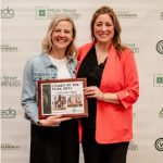 Karisa Mellinger (left), owner of Mama Llama's Barn in Washington, poses next to Washington Chamber of Commerce executive director Michelle Redlinger.