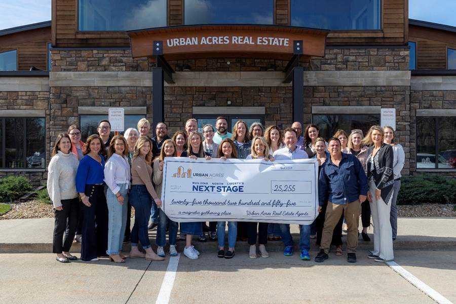 Agents with Urban Acres Real Estate donated $25,000 to North Liberty's Next Stage Campaign.