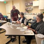 Residents at Cottage Grove Place take part in a painting workshop as a part of the Creative Arts Group.