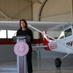 Cedar Rapids Mayor Tiffany O’Donnell speaks about Coe College's new flight school program in front of an airplane at the Eastern Iowa Airport on May 22, 2024, in Cedar Rapids. CREDIT PARKER JONES