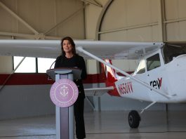 Cedar Rapids Mayor Tiffany O’Donnell speaks about Coe College's new flight school program in front of an airplane at the Eastern Iowa Airport on May 22, 2024, in Cedar Rapids. CREDIT PARKER JONES