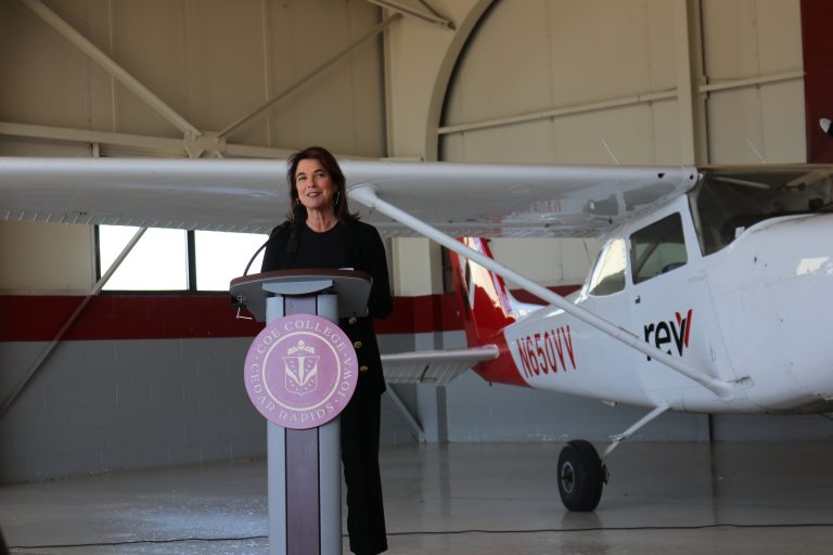 Cedar Rapids Mayor Tiffany O’Donnell speaks about Coe College's new flight school program in front of an airplane at the Eastern Iowa Airport on May 22, 2024, in Cedar Rapids. CREDIT PARKER JONES