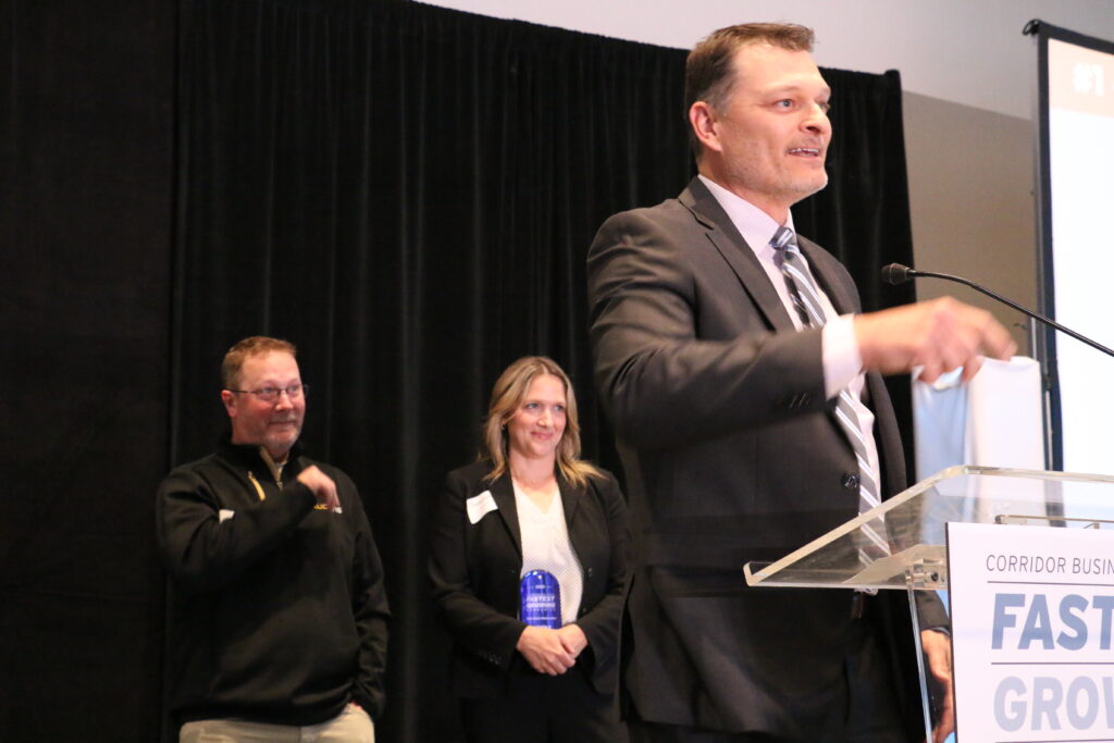 Scott Cornish co-owner and COO of Paul Davis Restoration accepts the title of Fastest Growing Company at June 11 event. CREDIT RICHARD PRATT