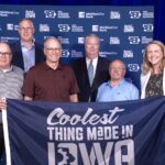 Vermeer Corporation team members pose with their Coolest Thing Made in Iowa trophy during the Iowa Association of Business & Industry (ABI) annual conference in Davenport. Front row, from left, are: Vermeer team members: Kent Thompson, R&D senior engineering manager; Stan Fynaardt, assembler III; Terry Patterson, assembler II; and Mindi Vanden Bosch, vice president of operations. Back row, from left, are: MidWestOne CEO Chip Reese and ABI President Mike Ralston. CREDIT IOWA ASSOCIATION OF BUSINESS & INDUSTRY
