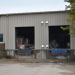 Damage to two bays is evident at 309 Herky St. in North Liberty. The explosion happened late Monday night.