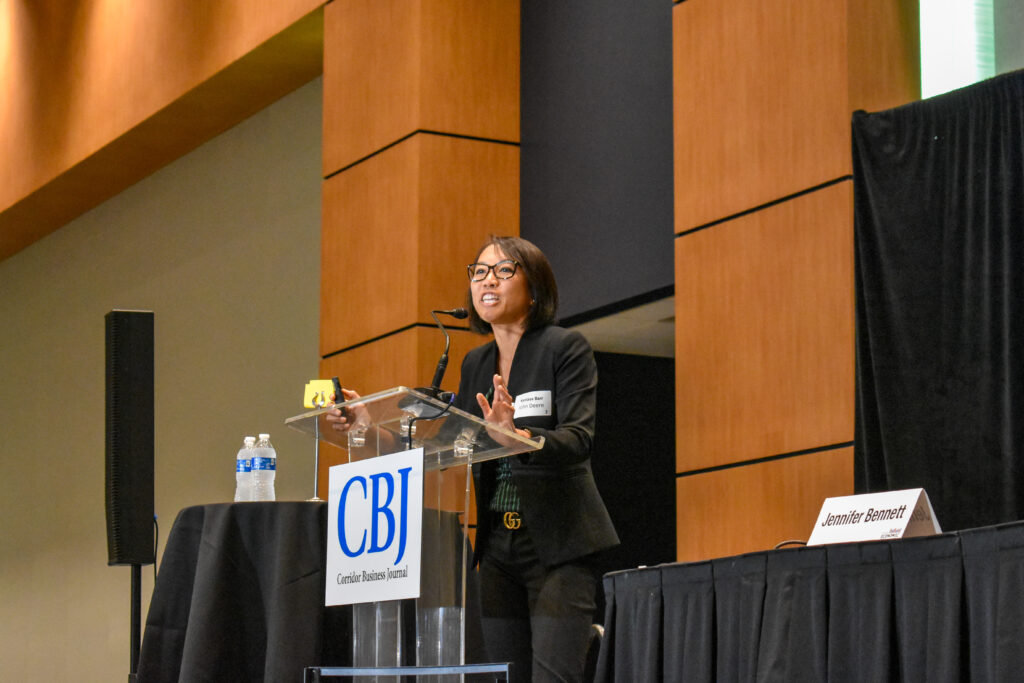 Kanlaya Barr, director of corporate economics at John Deere, speaks at the Corridor Business Journal's Mid-Year Economic Review on July 10. CREDIT ALEXANDRA OLSEN