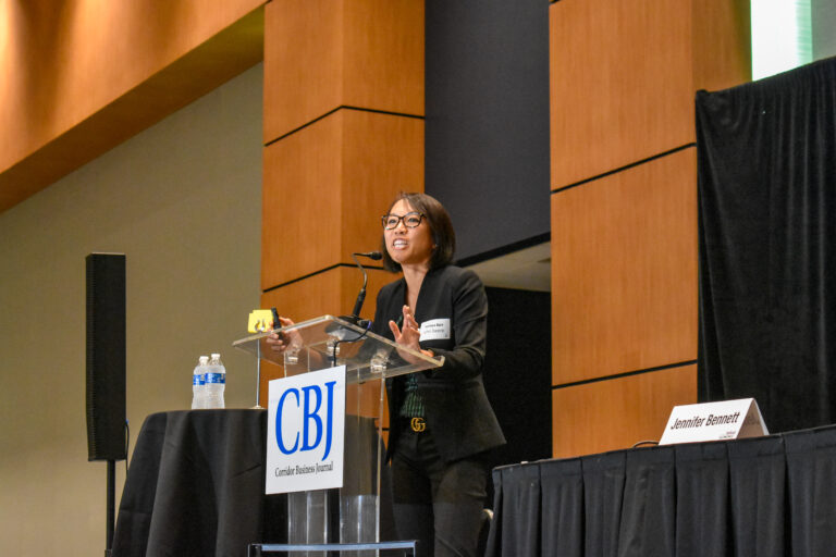 Kanlaya Barr, director of corporate economics at John Deere, speaks at the Corridor Business Journal's Mid-Year Economic Review on July 10. CREDIT ALEXANDRA OLSEN
