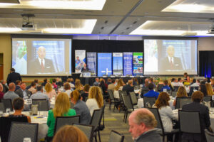 John Lohman, Corridor Business Journal CEO, speaks at the Future of the Corridor event, July 26, 2024. CREDIT ALEXANDRA OLSEN