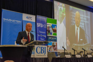 John Lohman, Corridor Business Journal CEO, speaks at the Future of the Corridor event, July 26, 2024. CREDIT ALEXANDRA OLSEN