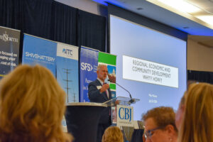 Keynote speaker Mike Malone, vice chancellor for economic development with the University of Arkansas, speaks at the CBJ's Future of the Corridor event. CREDIT ALEXANDRA OLSEN