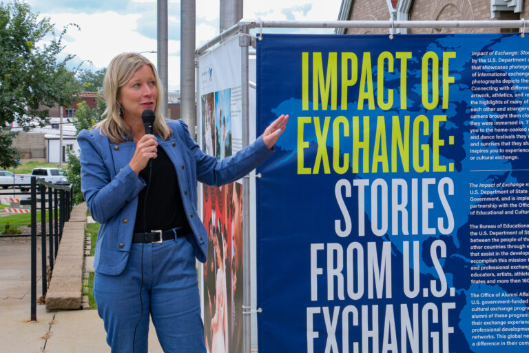 Dawn Wood, director of global learning at Kirkwood Community College, speaks Aug 9 at the opening of the "Impact of Exchange" photo exhibit at the National Czech & Slovak Museum & Library in Cedar Rapids. CREDIT RICHARD PRATT