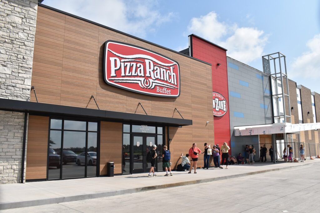 Diners line up outside Pizza Ranch in North Liberty
