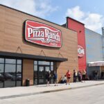 Diners line up outside Pizza Ranch in North Liberty