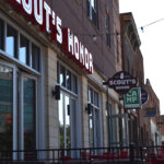 Signs for Scout's Honor and Camp are prominently displayed on Iowa Avenue. Both eateries were recipients of CoSign.