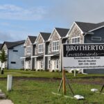 Recently finished townhomes line the west side of North Kansas Avenue. The homes are part of new subdivision Water Tower Place.