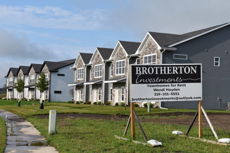 Recently finished townhomes line the west side of North Kansas Avenue. The homes are part of new subdivision Water Tower Place.