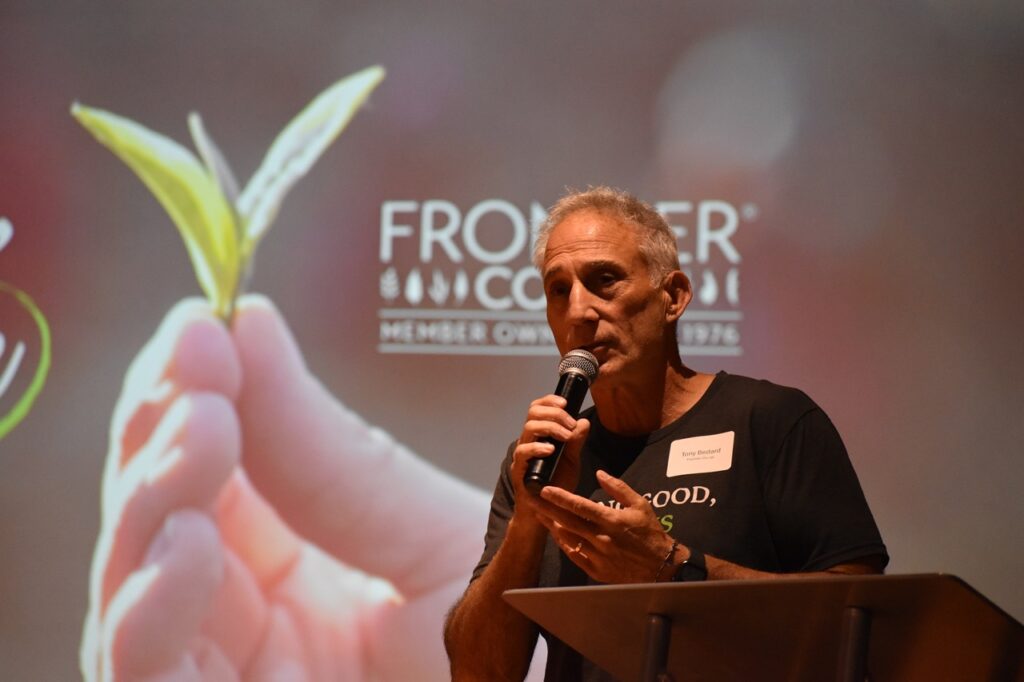 Frontier Co-op's CEO, Tony Bedard, addresses the audience at the Sept. 11 "Doing Good, Works" event in Cedar Rapids.