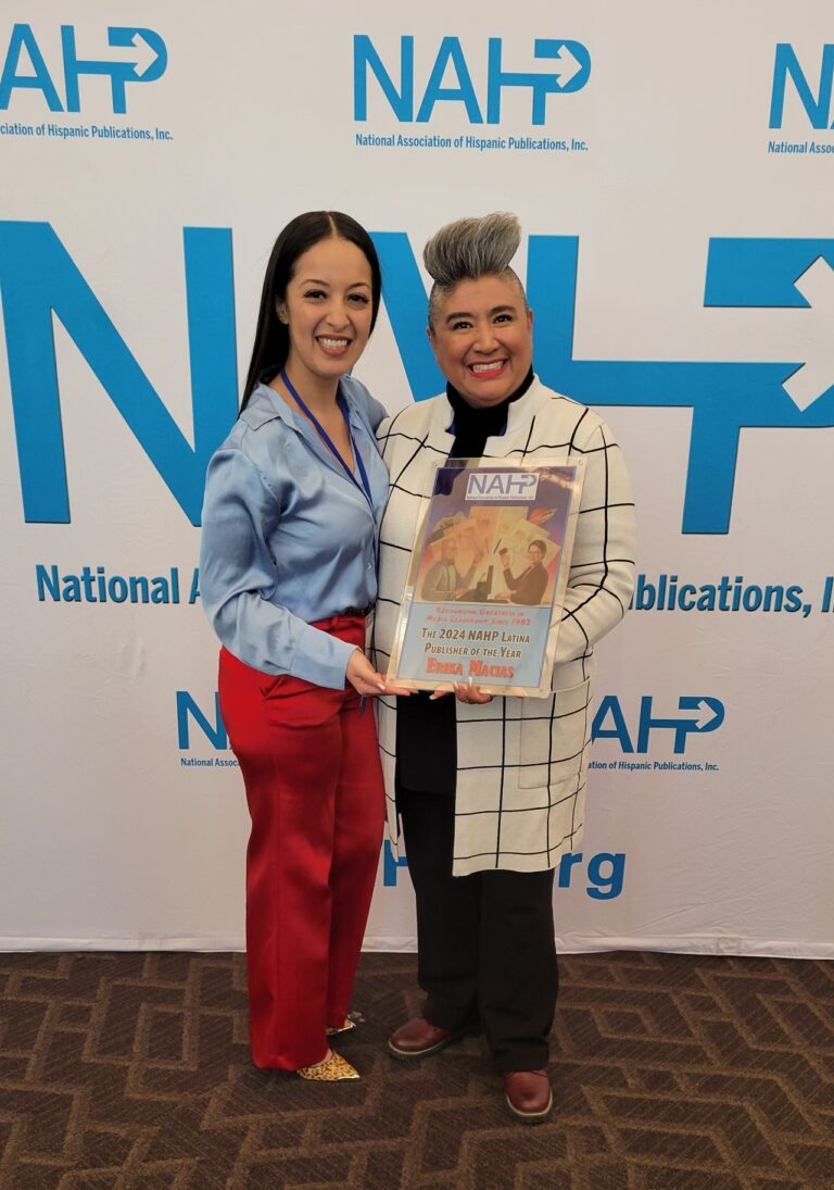 Evelyn Castro (left), secretary of National Association of Hispanic Publications (NAHP), presents Erica Macias with the Latina Publisher of the Year award.