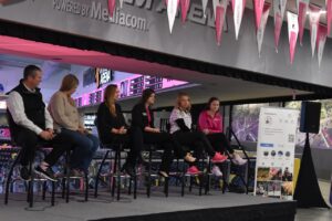 (Left to right) Panelists Matt Traetow, general manager of the Coralville Hyatt Regency Hotel & Conference Center; Betsy Potter, executive director of the Iowa City Downtown District; Deanna Printy, manager of the Iowa River Landing Development; Emily Downes, associate director of Aquatics at University of Iowa; Erin Gerlich, executive director of the Iowa Girls High School Athletic Union; and Kylee Walker, Sports Development manager of the Iowa City Area Sports Commission.