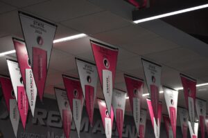 Banners hanging in the lobby of the Xtream Arena Nov. 4 herald the 2024 Iowa High School Girls State Volleyball championships.