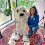 Jessica Bass poses with her unique hand-crocheted creations.