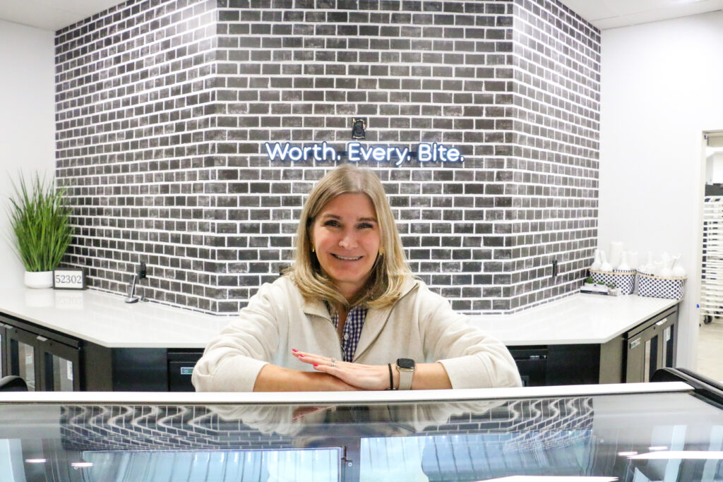 Cheryl Maloney at the front counter of The Eat Shop’s new location in Uptown Marion. The bakery, at 1107 Seventh Ave., is set to open Feb. 1. CREDIT RICHARD PRATT