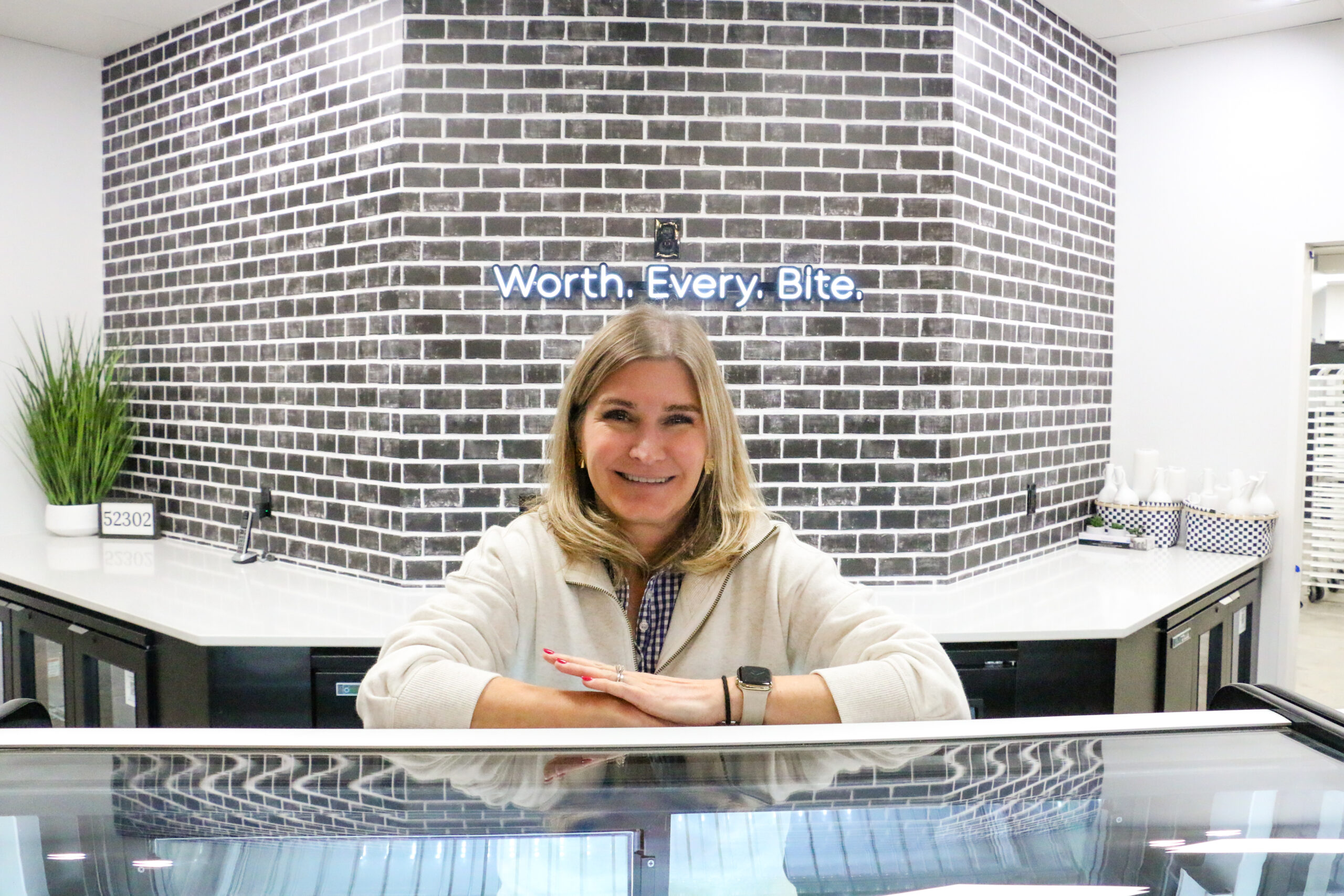 IMG_0229 Cheryl Maloney at the front counter of The Eat Shop’s new location in Uptown Marion. The bakery, at 1107 Seventh Ave., is set to open Feb. 1. CREDIT RICHARD PRATT
