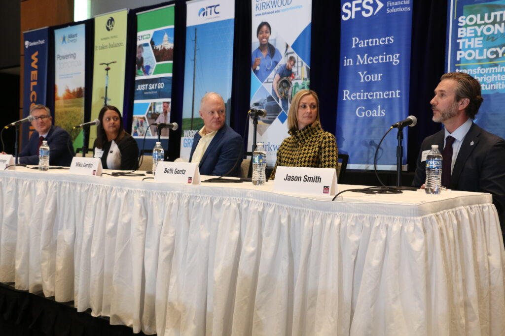 Panelists Brent Cobb, CEO of World Class Industries; May Farlinger, president of Interstate Power & Light Company and vice president of operations for Alliant Energy Corporation; Mike Gerdin, president and CEO of Heartland Express; Beth Goetz, director of athletics at the University of Iowa; and Jason Smith, CEO of TrueNorth Companies pictured at the CBJ's 2025 Economic Forecast Luncheon. CREDIT RICHARD PRATT