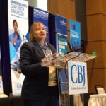 Anne Villamil delivers the keynote speech at the Corridor Business Journal's annual Economic Forecast Luncheon on Jan. 15 in Cedar Rapids. CREDIT PARKER JONES