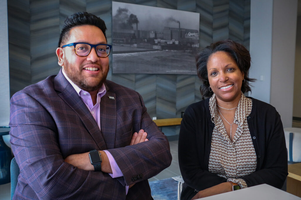 Downtown District executive director Caleb Knutson and program manager Jennifar Bassett are shown at the DoubleTree by Hilton Cedar Rapids Convention Complex in downtown Cedar Rapids. CREDIT RICHARD PRATT