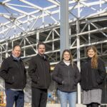 (From left) Hy-Vee officials Kerry Sherlock, Tony Morrow, Jillian Miller (with the city of North Liberty), Elise Scheil and Aaron Lammers.