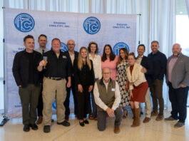 A Toast to Business award winners pose May 1 at the Hancher Auditorium in Iowa City. Greater Iowa City, Inc.'s inaugural event recognized outstanding contributions to economic growth, workforce development, and community leadership across Johnson County.