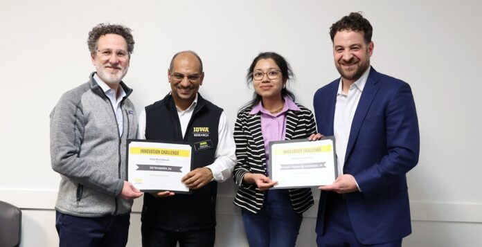(Photo by Darren Miller) Winners of the UI John Pappajohn Entrepreneurial Center's Innovation Challenge. (Second from left) S5G Therapeutics, and (second from right) Cellular Engineering Technologies.