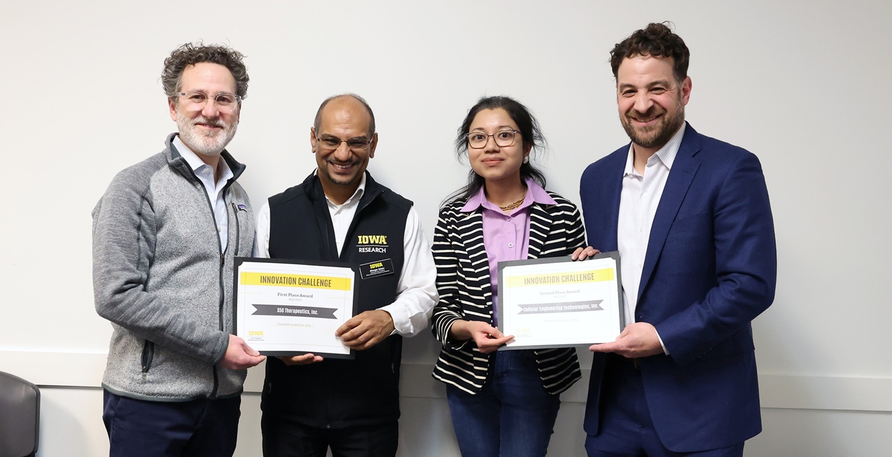 (Photo by Darren Miller) Winners of the UI John Pappajohn Entrepreneurial Center's Innovation Challenge. (Second from left) S5G Therapeutics, and (second from right) Cellular Engineering Technologies.