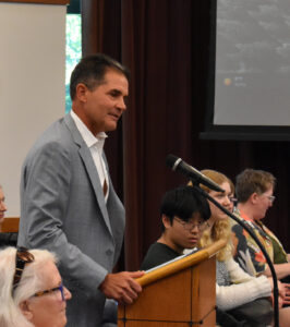 Mark Kaufman speaks to the Coralville city council May 13.