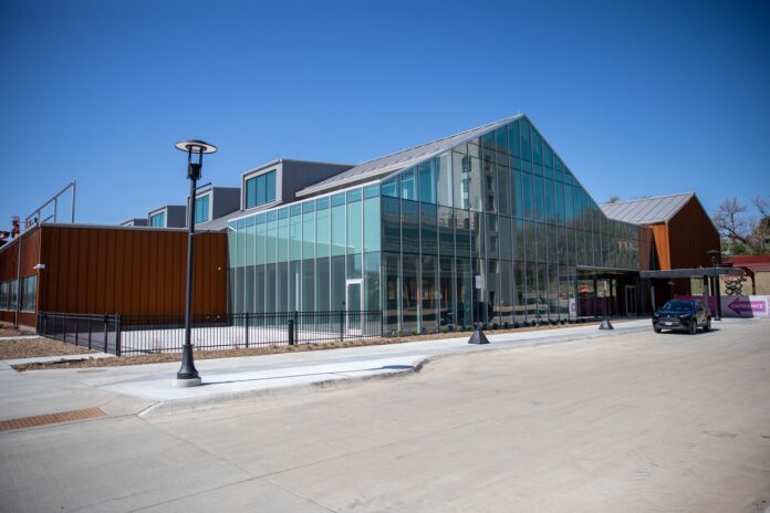 Omaha-TaproomProgress-4.15.25 The exterior of Big Grove Brewery's Omaha location, which is set to open this summer. The craft brewery is planning another location for Kansas City in summer 2026.