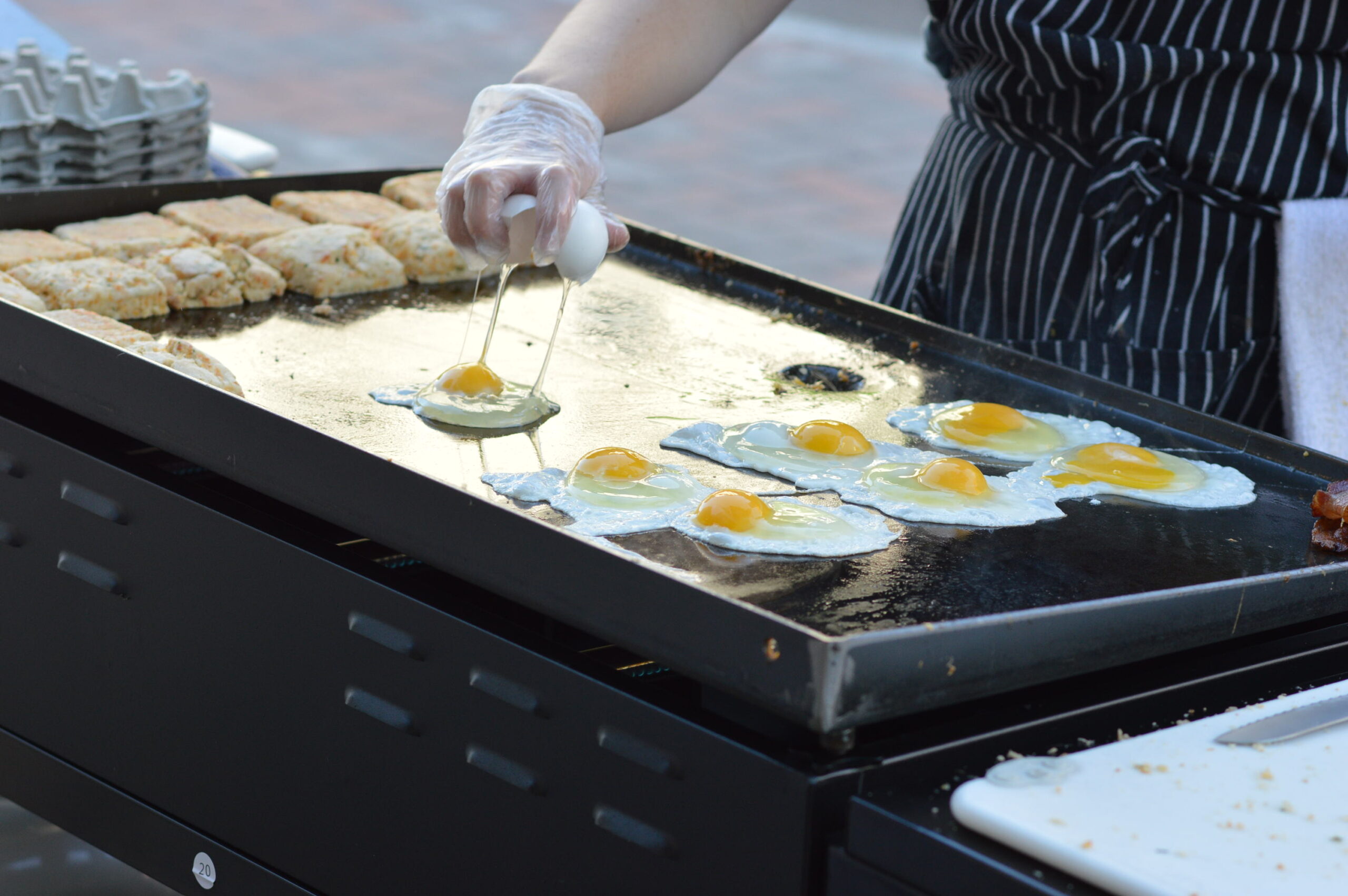 dtfm feedwell eggs Eggs fry on the grill of Feedwell Kitchen & Bakery during a previous Downtown Farmers Market in Cedar Rapids. Farm-fresh eggs are expected to be in high demand at markets this year. CREDIT CINDY HADISH