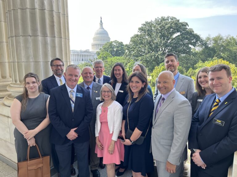 Economic and civic leaders from the Iowa Corridor pose with Representative Mariannette Miller-Meeks during the D.C. Fly-In.