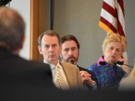 Regent David Barker listens to UI Health Care CEO Brad Haws discuss plans for the university's patient care tower on Wednesday, June 11, 2025.