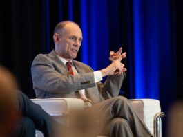Chicago Fed President and CEO Austan Goolsbee makes a point at the Monday, June 2 QCBJ Mid-Year Economic Review at Rhythm City Casino Resort. CREDIT TODD WELVAERT