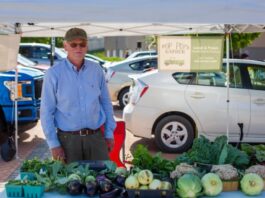 A vendor with the Coralville Farmer's Market
