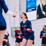An Iowa United Volleyball club member celebrates during the 2025 Iowa Regionals Weekend.